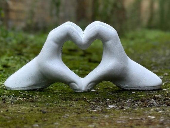 Personalização Extrema: Deixe Sua Mão de Cimento com a Sua Cara - inspiração 1