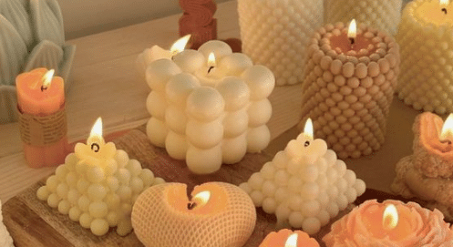 Velas com Elementos Naturais: Folhas, Flores e Madeira - inspiração 1