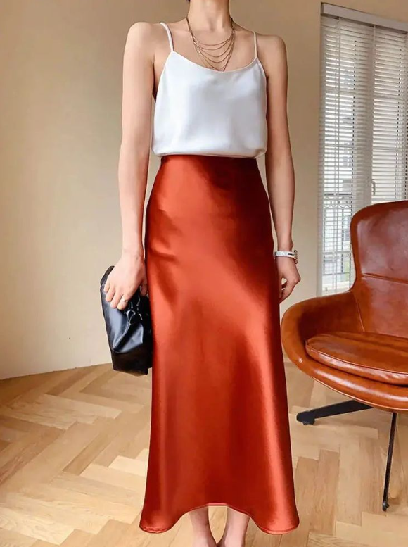 combinar blusa com saia longa