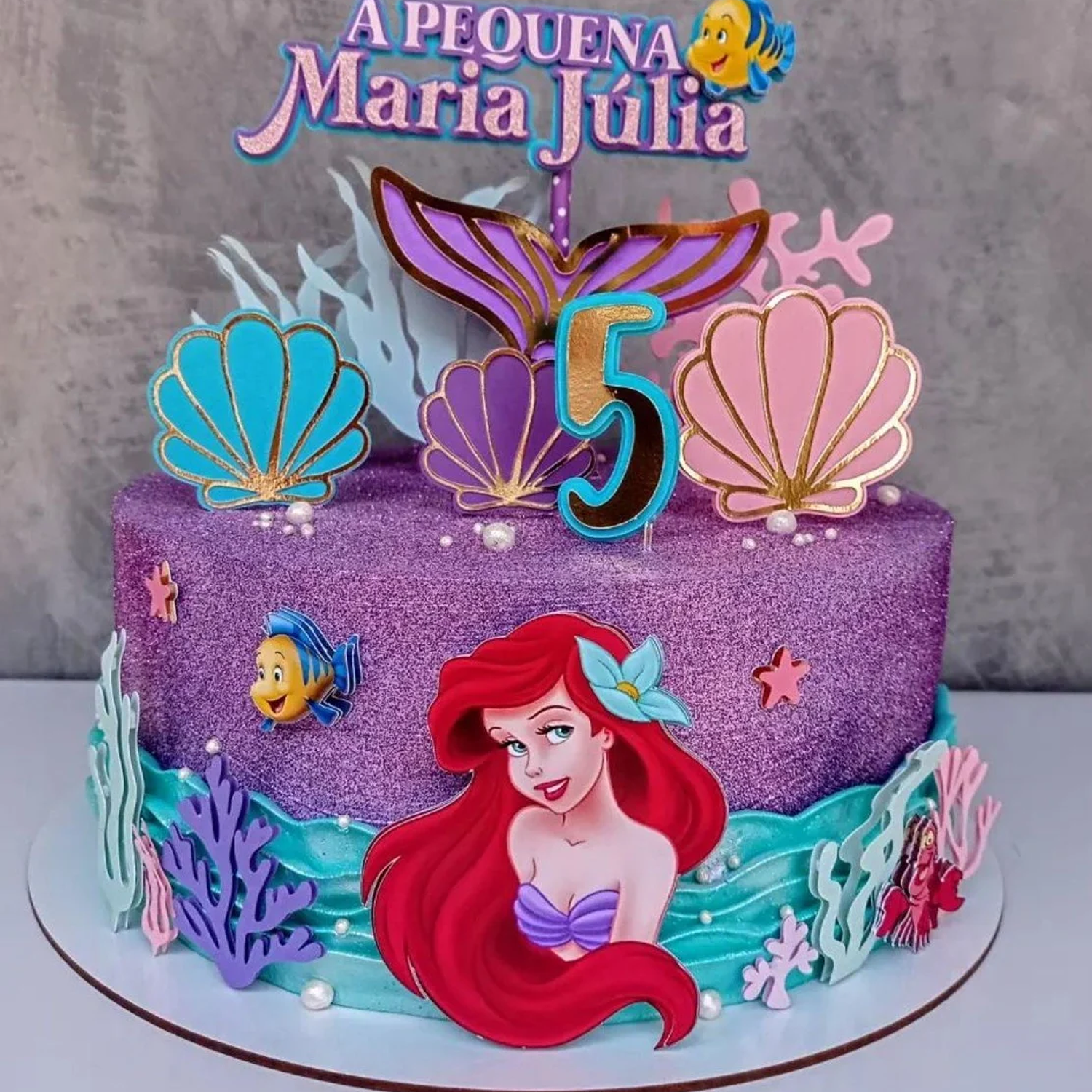 Top 10 Ideias Criativas de Topos de Bolo da Pequena Sereia
