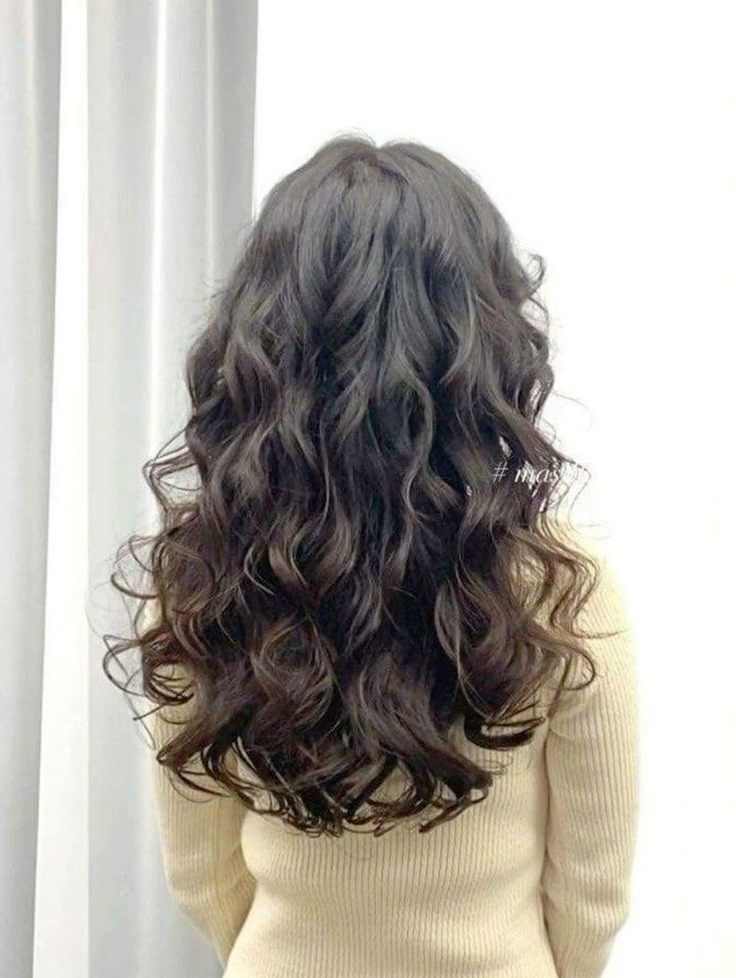 cabelo feminino ondulado grande