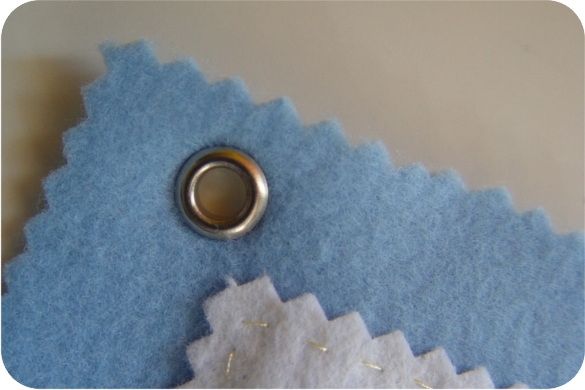 fixar ilhós com martelo e kit manual