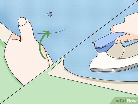 como consertar um furo na roupa