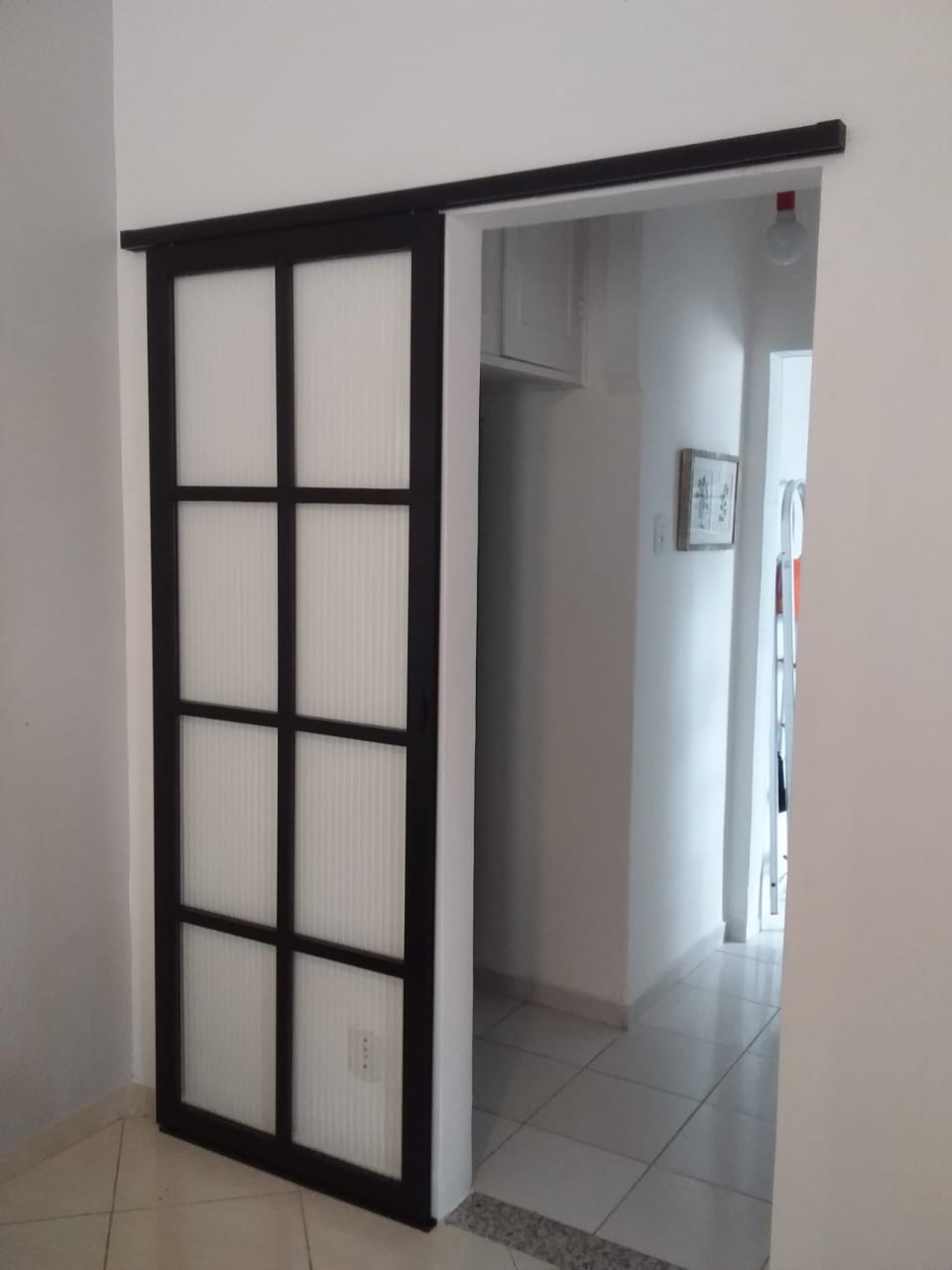 como instalar porta de correr