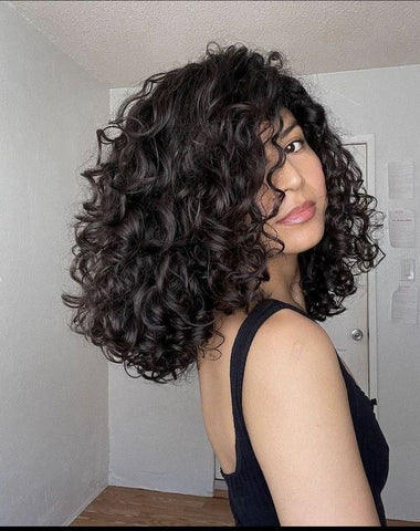 melhores cortes para cachos definidos