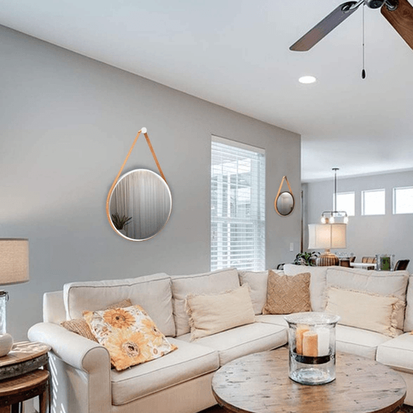 espelho redondo com alça de couro