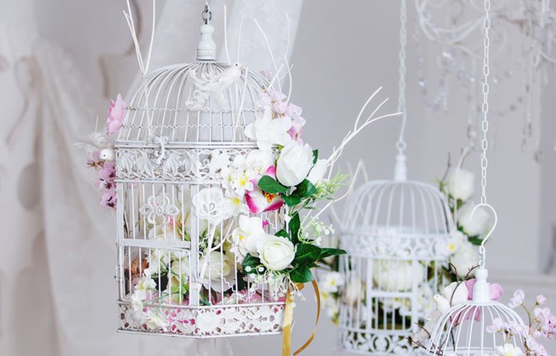 transformar gaiola antiga em vaso de flores