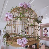 transformar gaiola antiga em vaso de flores