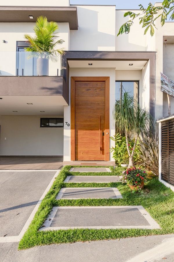 fachada de sobrado com pe direito duplo