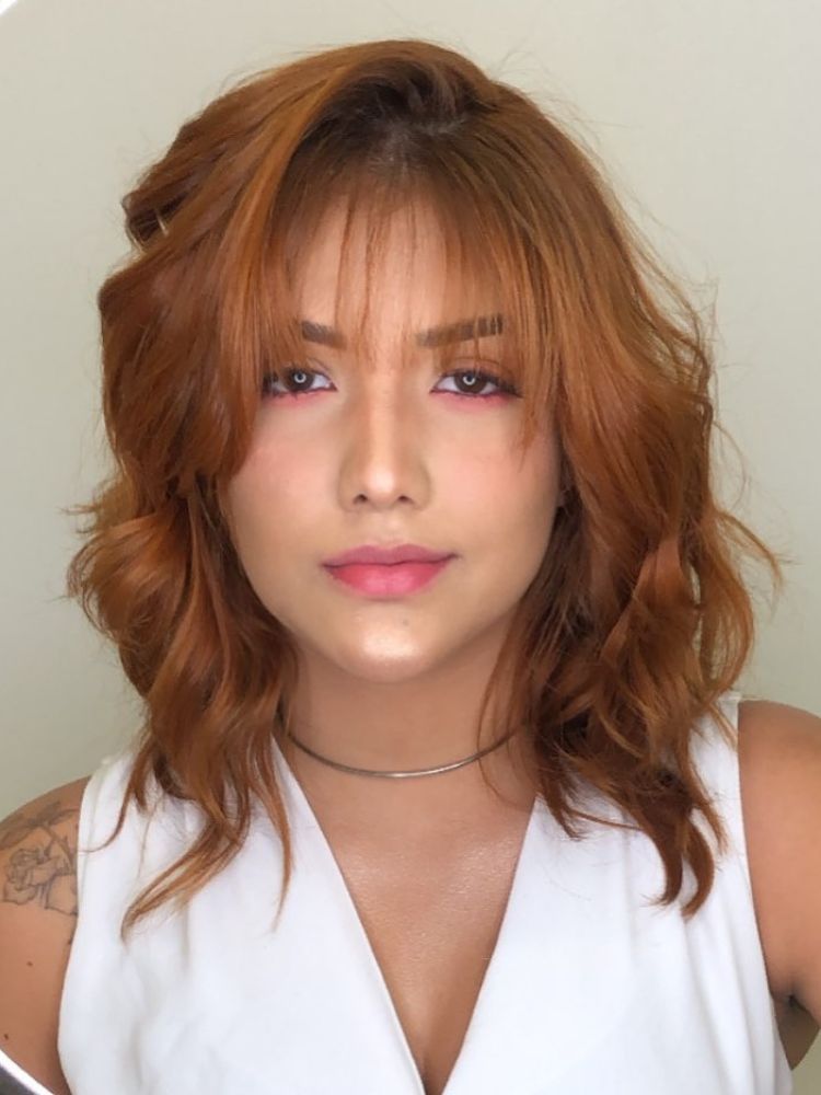 pixie cut ou tapered cut para rosto redondo cacheado