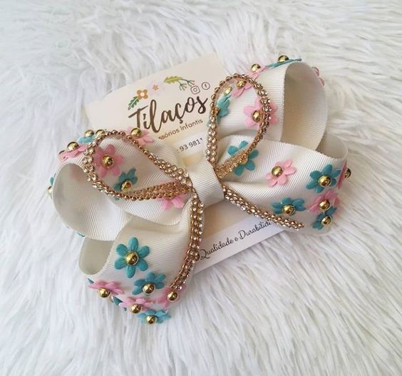 laços de cabelo infantil diferentes