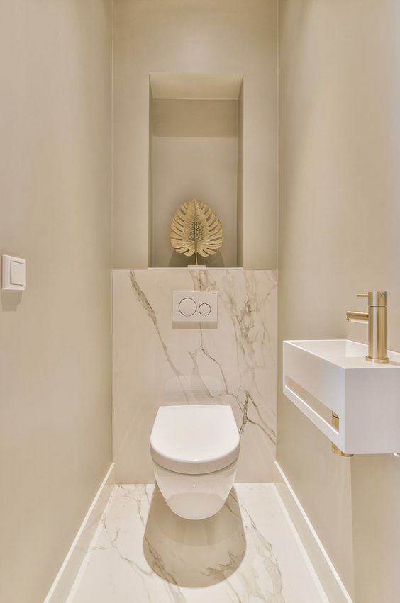 lavabo pequeno com cuba esculpida