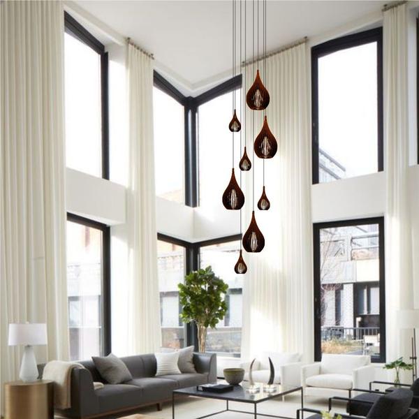 O impacto do lustre na decoração de ambientes com pé direito duplo