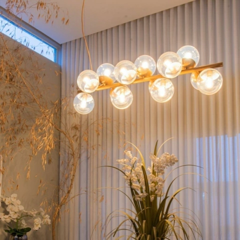 Como escolher o lustre perfeito para sua sala de estar