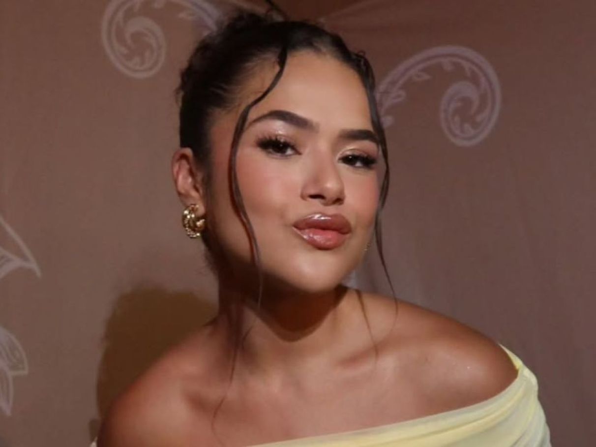 A importância da pele iluminada com vestido amarelo