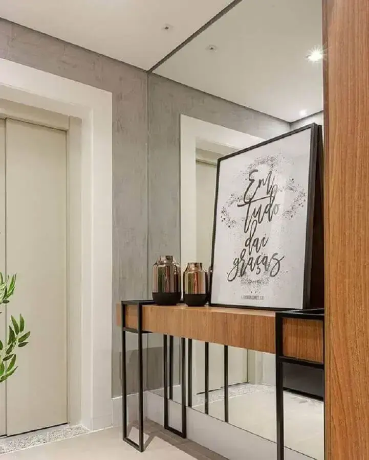 decoração de hall de entrada com espelho