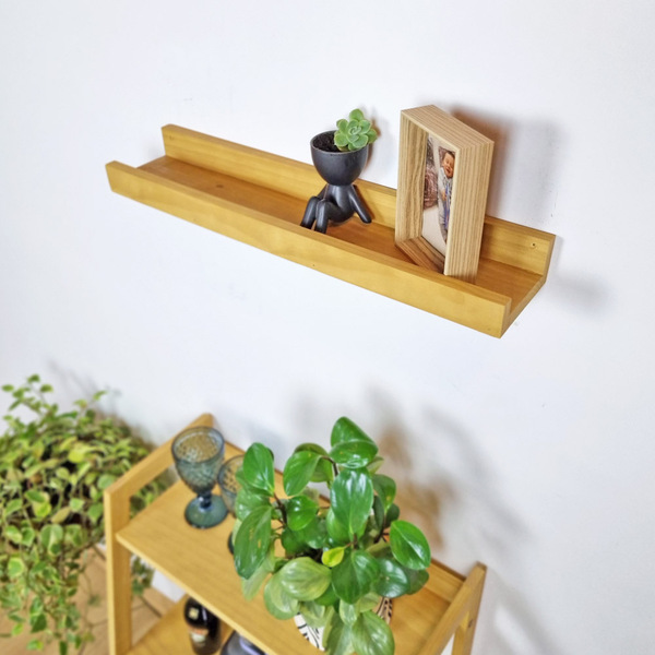 prateleira para expor quadros sem furar a parede