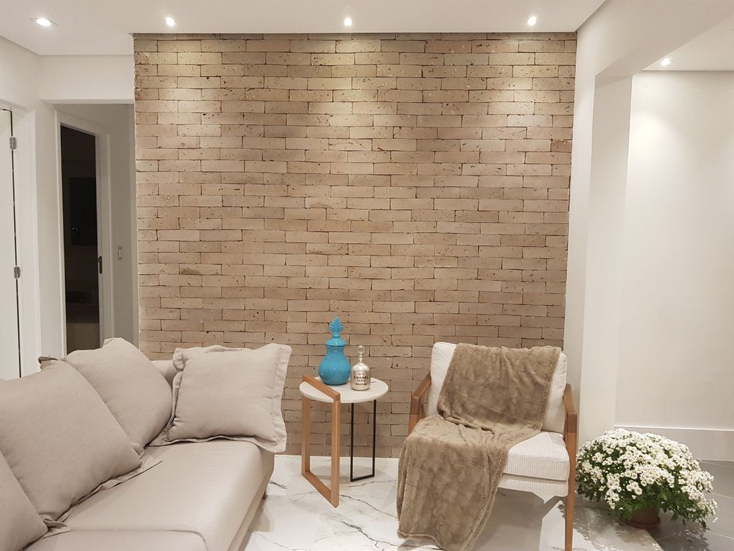 manutenção de parede de tijolos aparentes