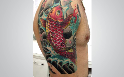 Tatuagem de Carpa: Guia Completo dos Significados por Cor e Direção