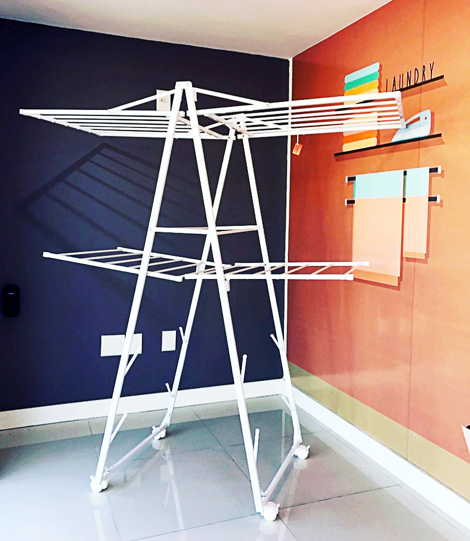 Soluções criativas para secar roupas em espaços reduzidos